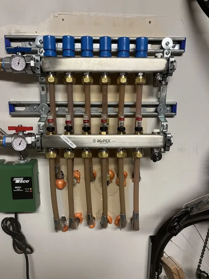 Plumber performing Gas Line Installation at a residential property in Troy